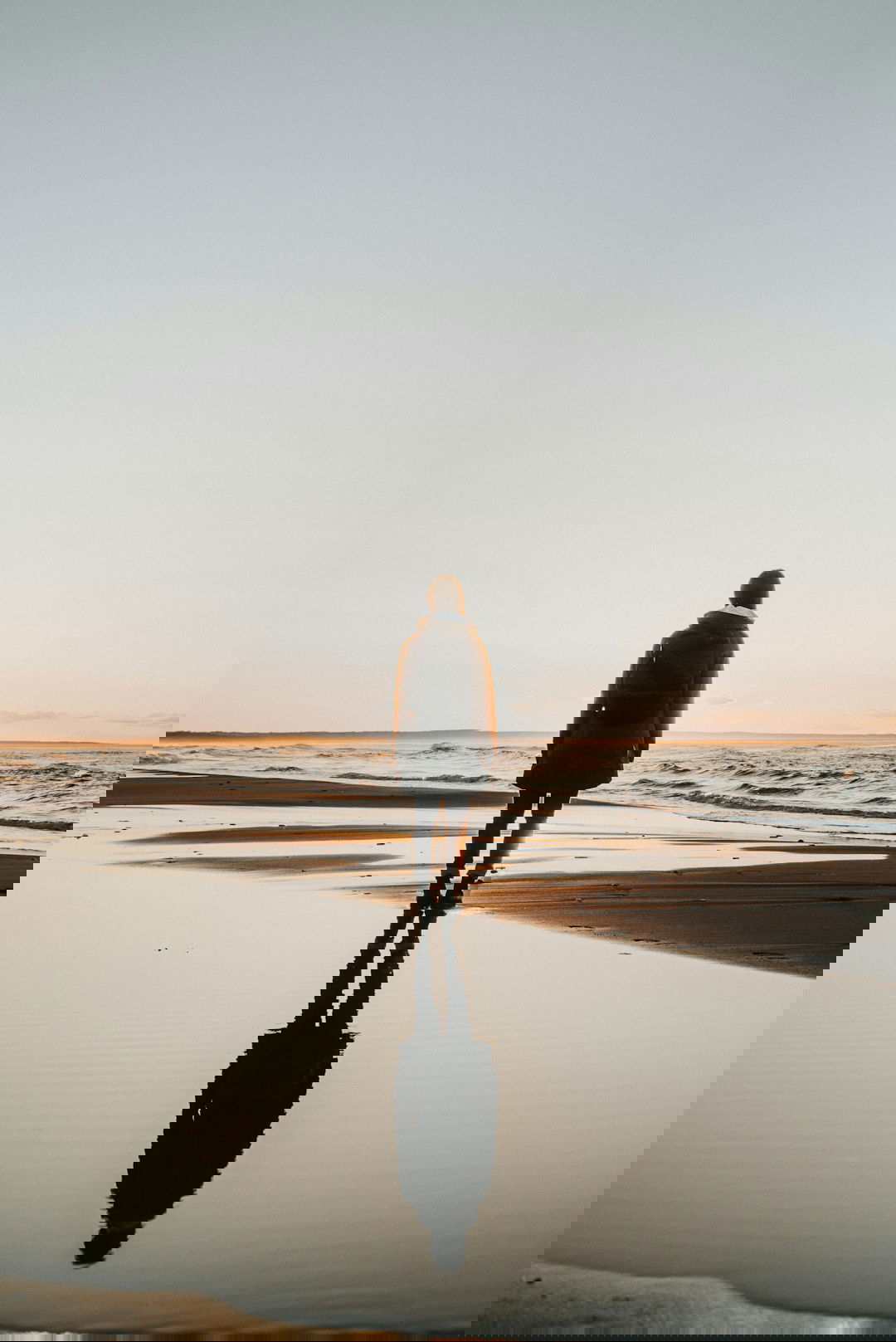 woman-standing-on-sands-near-shoreline.jpg woman standing on sands near shoreline